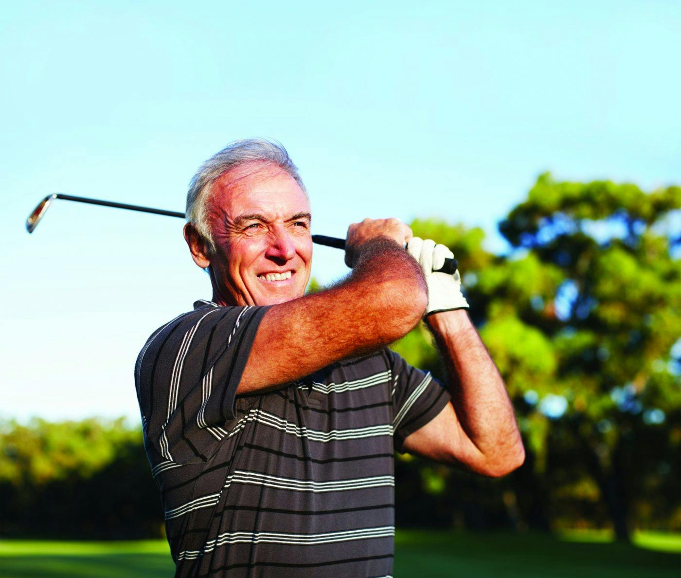 Mature Man Playing Golf I Stock 154957215