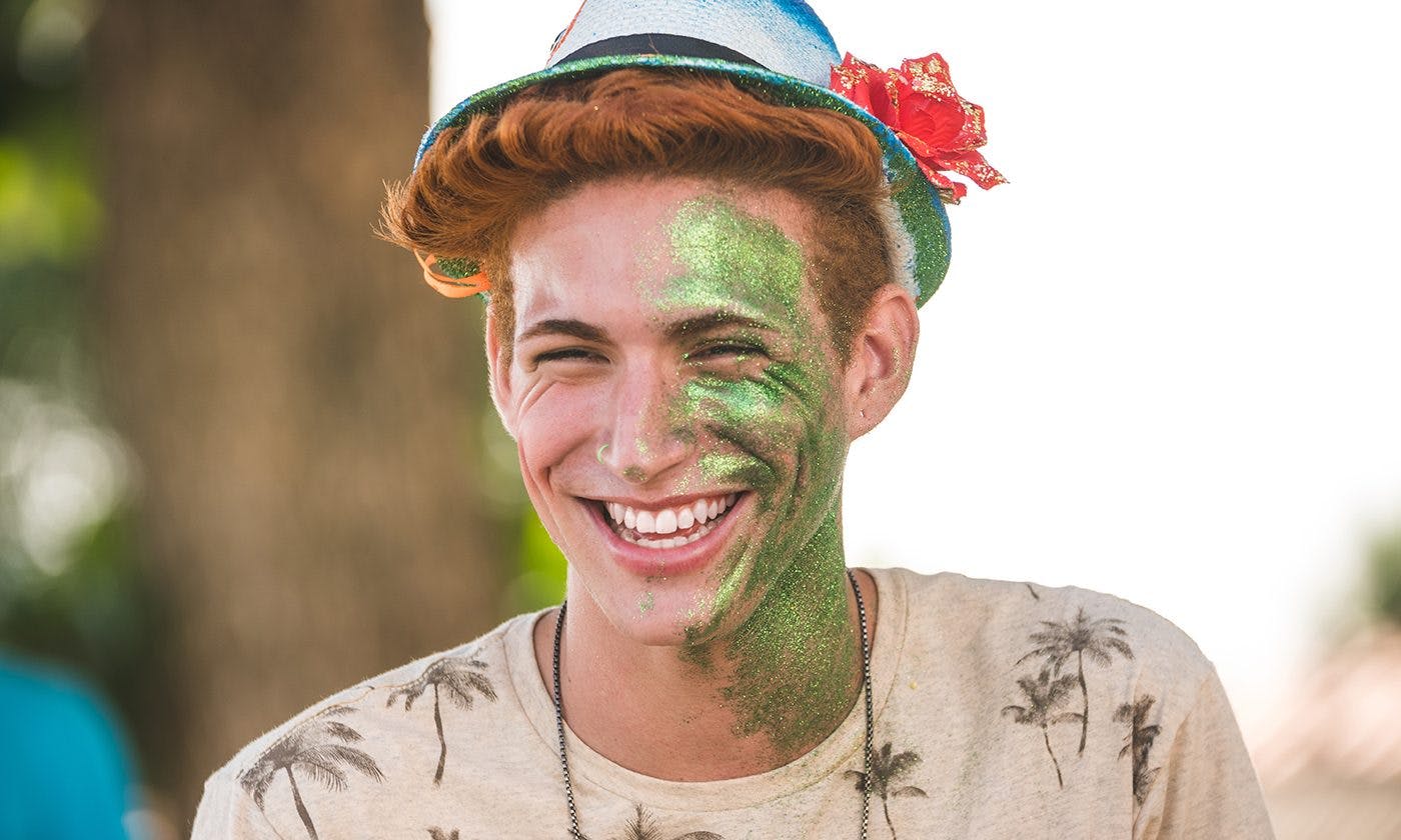 Young Man Green Glitter Face