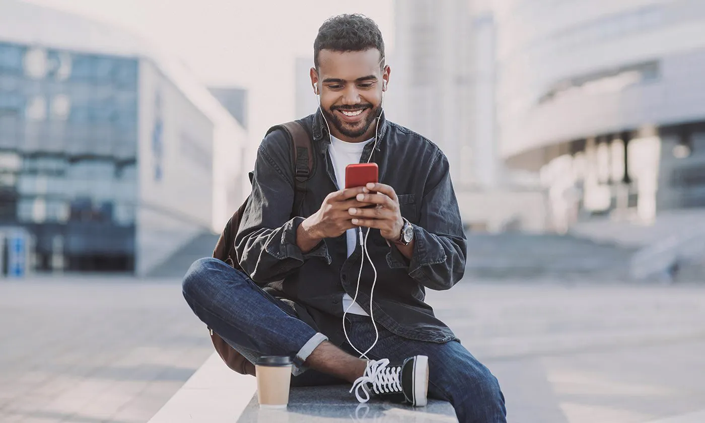 Young Man Phone Ear Buds