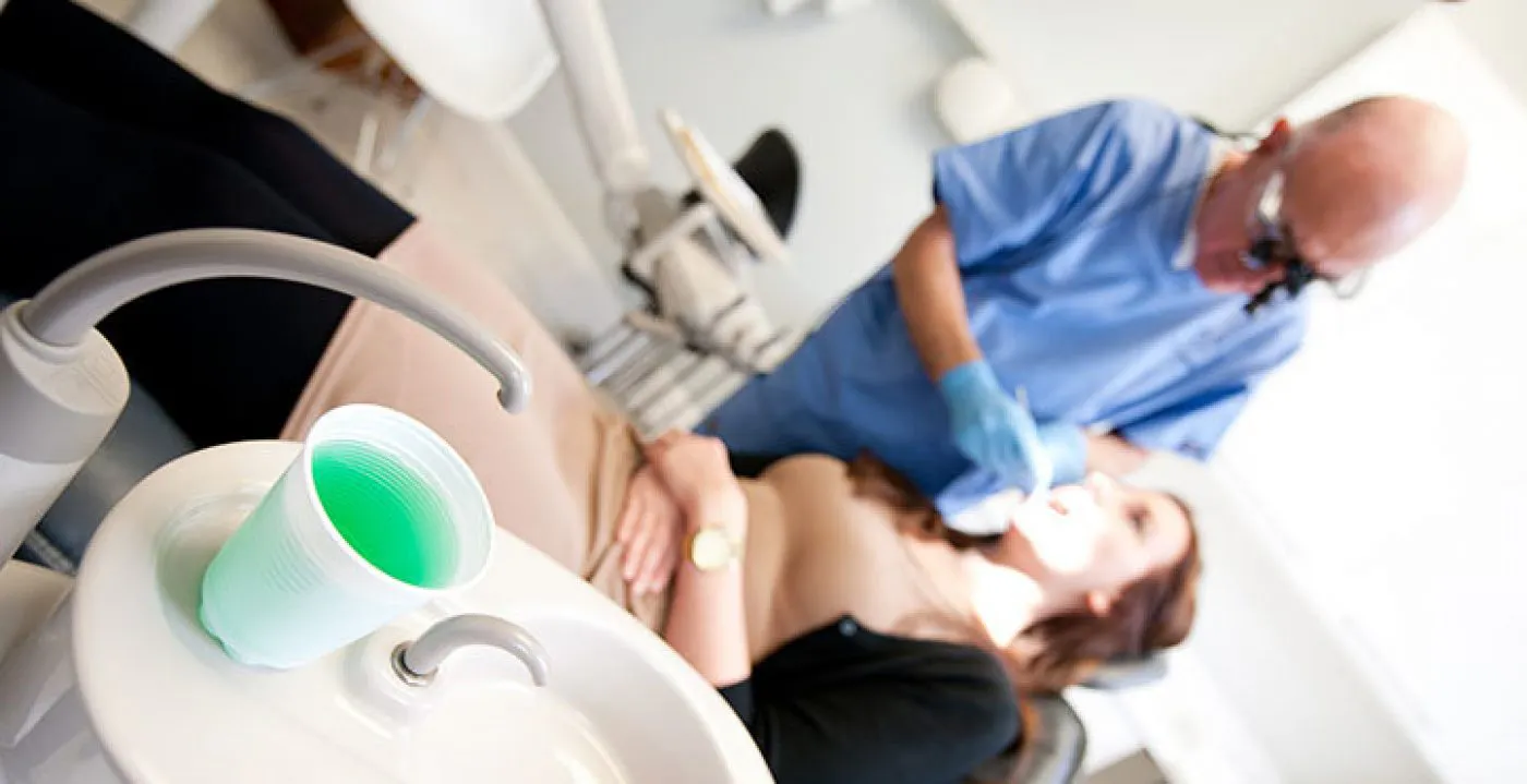 Dentist Treating Patient - Treatments - Portman Dental Care