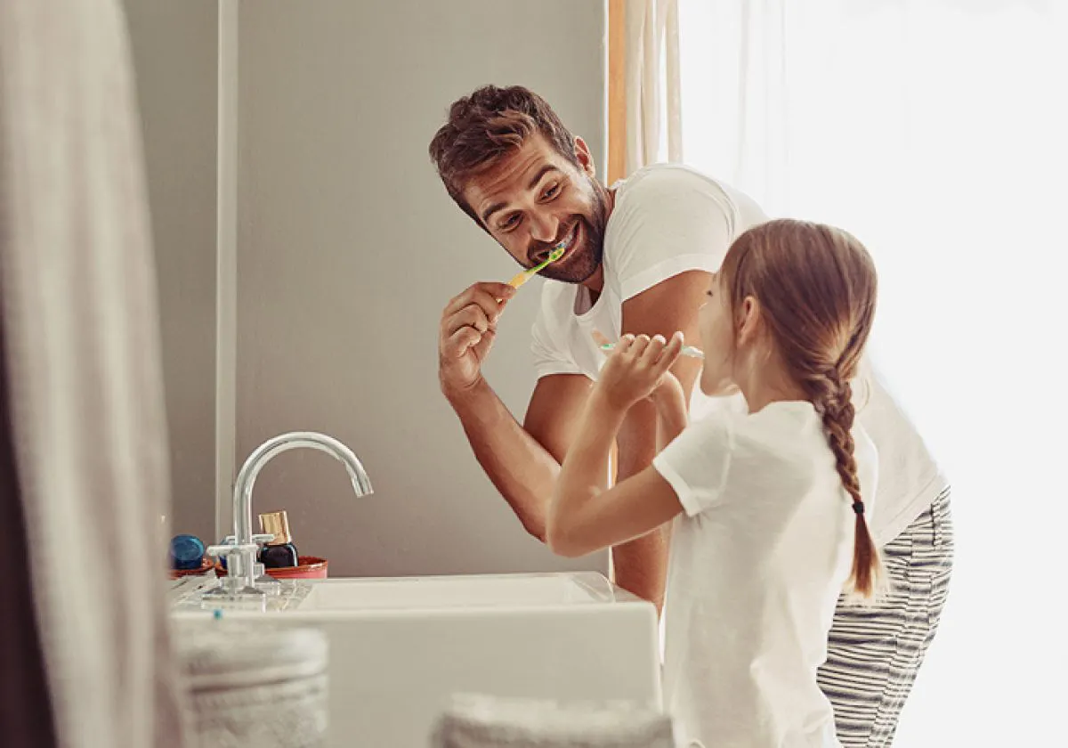 Father Daughter Brushing Teeth