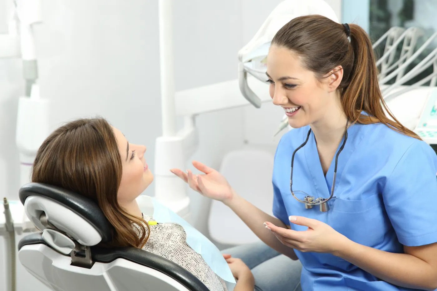 Dentist And Patient Consult