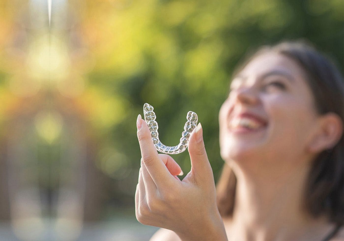 Happy Woman With Invisalign